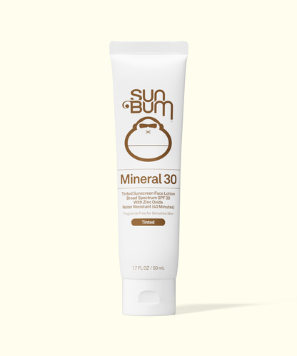 Sun Bum Mineral 30 sunscreen lotion tube on a beige background