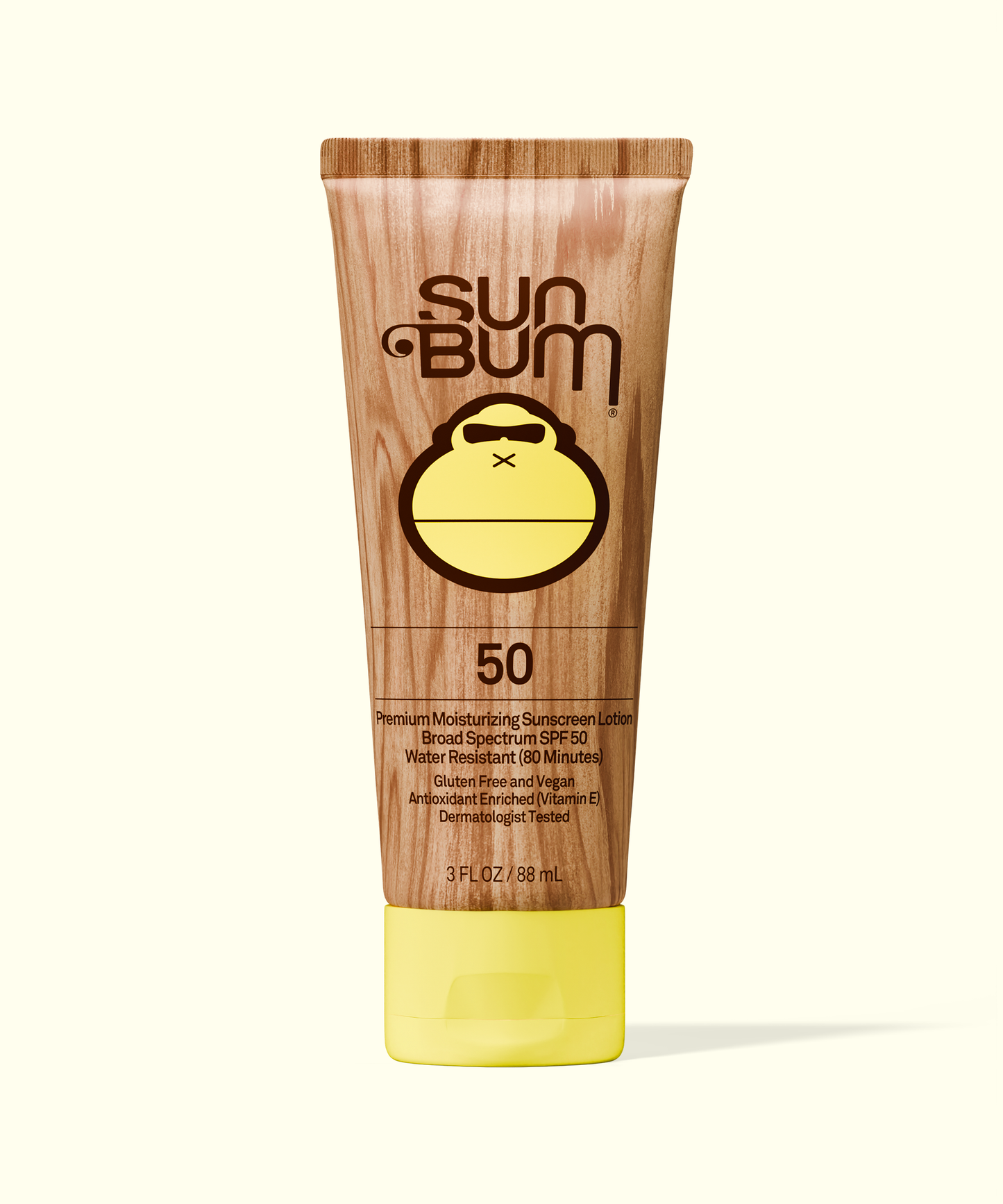 Sun Bum Original SPF 50 Sunscreen Lotion in a wood-grain tube with yellow cap, moisturizing and broad spectrum protection.