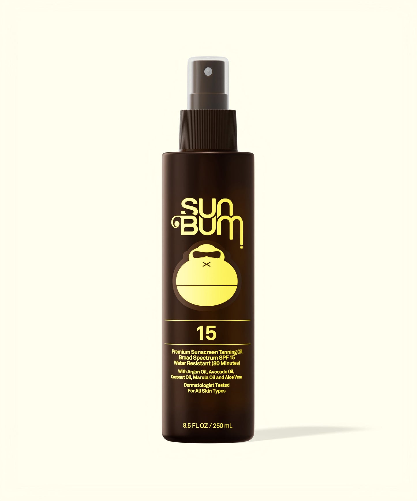 Sun Bum SPF 15 Sunscreen Tanning Oil in a brown spray bottle with yellow logo and text on white background